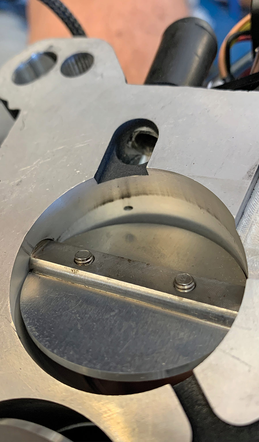 Throttle plate in the partially open position.
