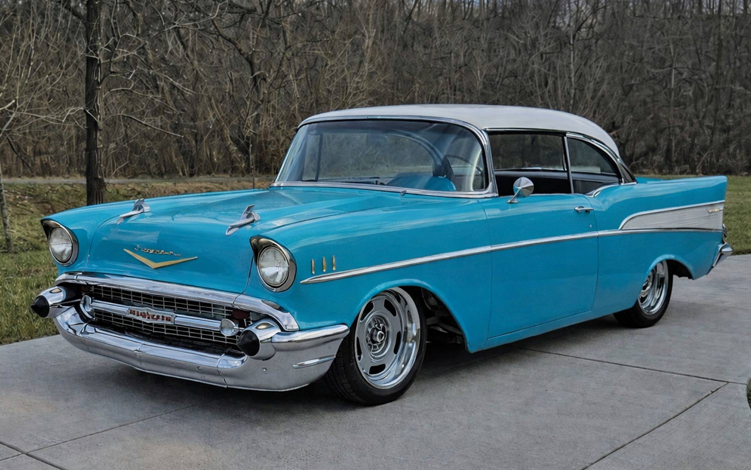 Blue 1957 Chevrolet Bel Air front three-quarter view