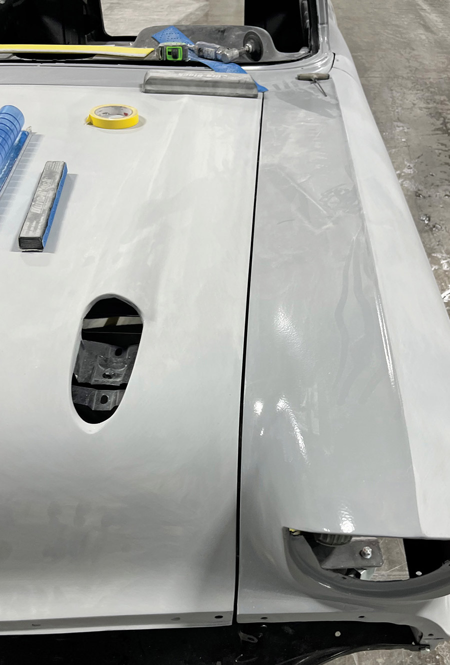 Block-sanding high-build polyester primer on every panel