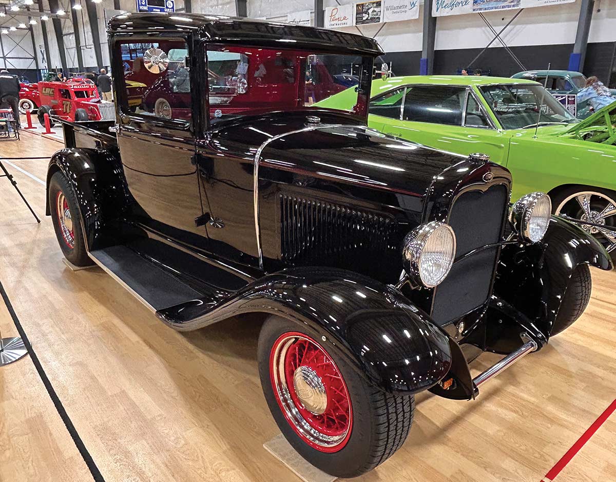 Black 1931 Ford Model A pickup truck front three-quarter view