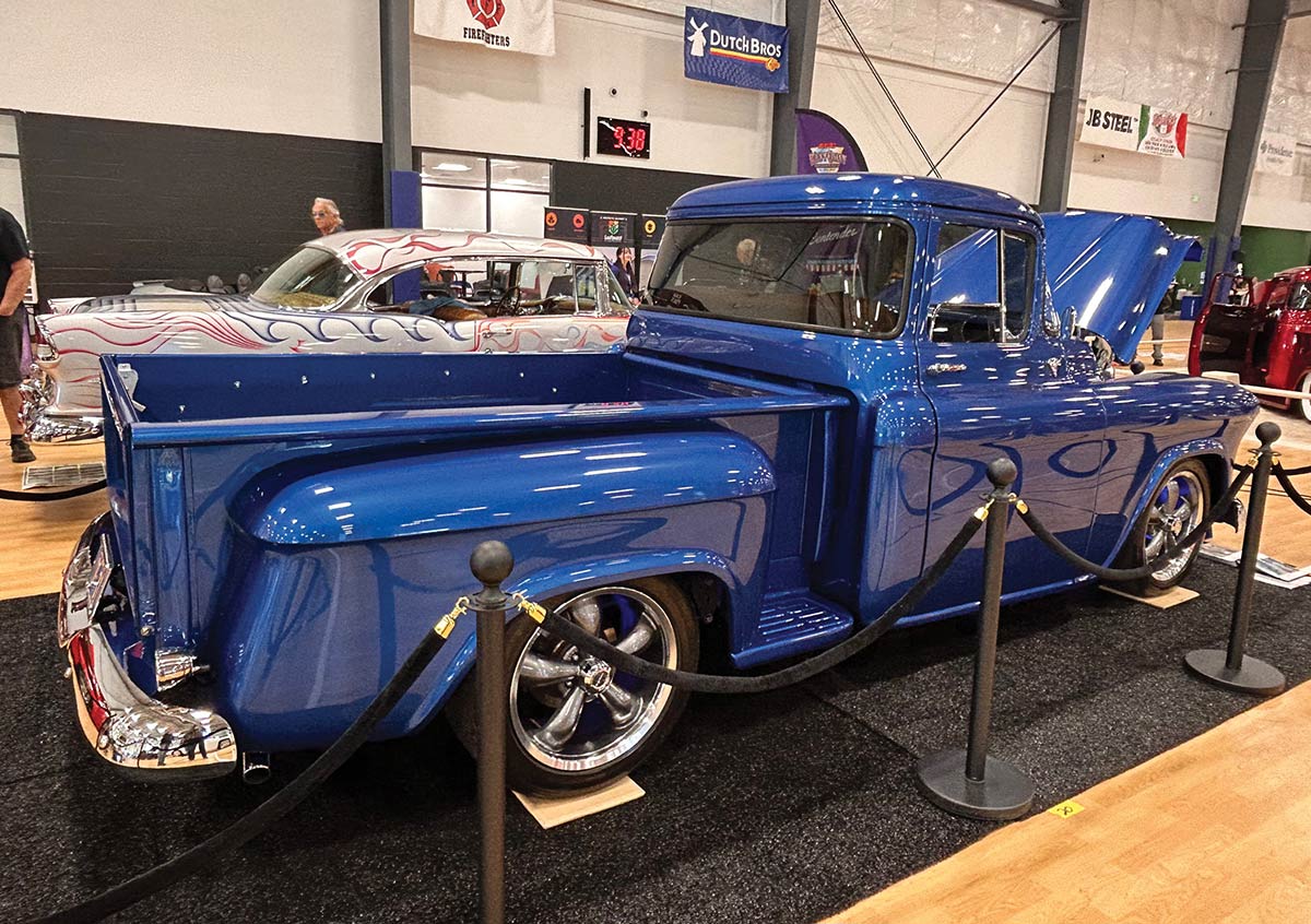 Dark blue 1957 Chevy 3100 pickup rear angle