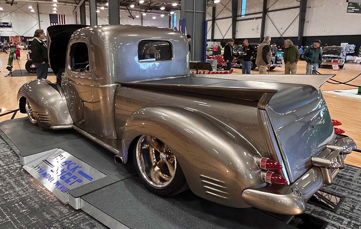 Silver custom 1940 Dodge pickup rear three-quarter view
