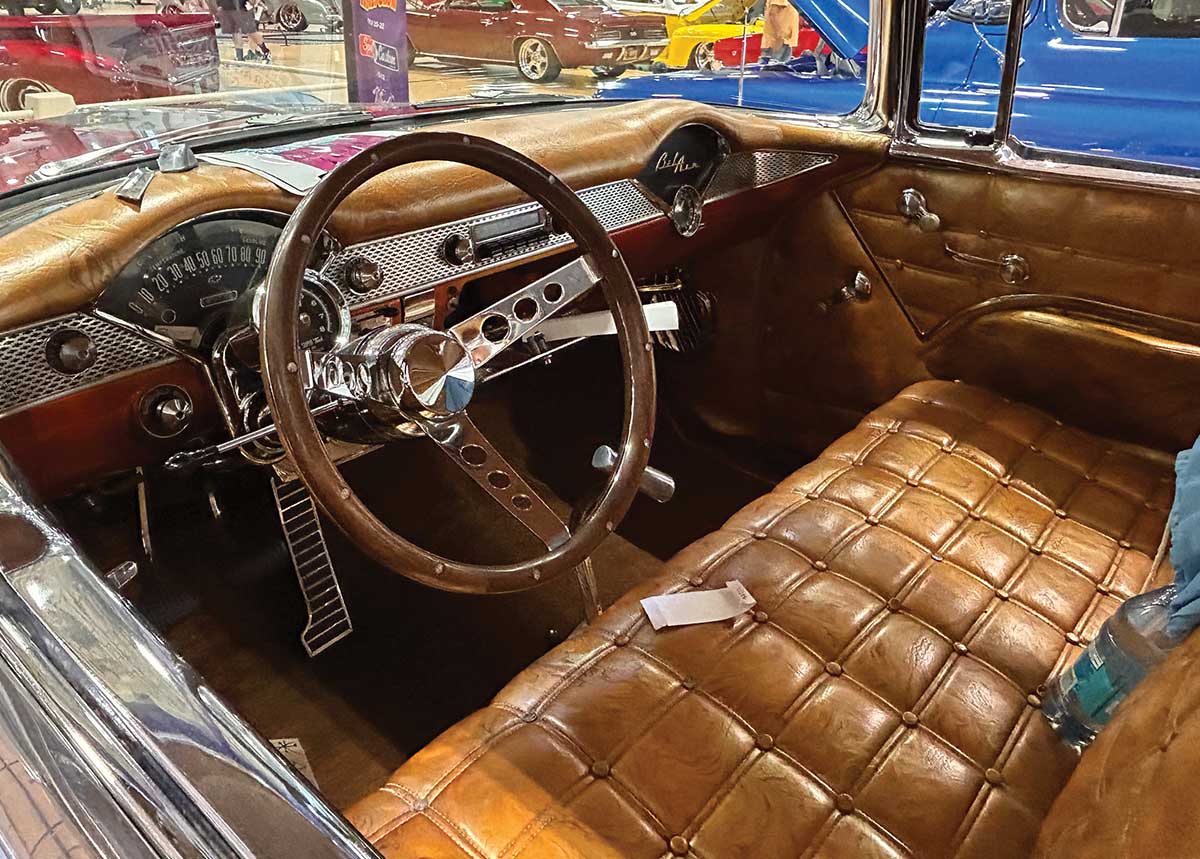 Brown tufted leather interior of custom 1955 Chevy