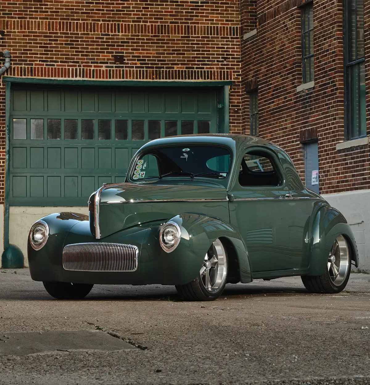 Front three-quarter view of green 1941 Willys coupe