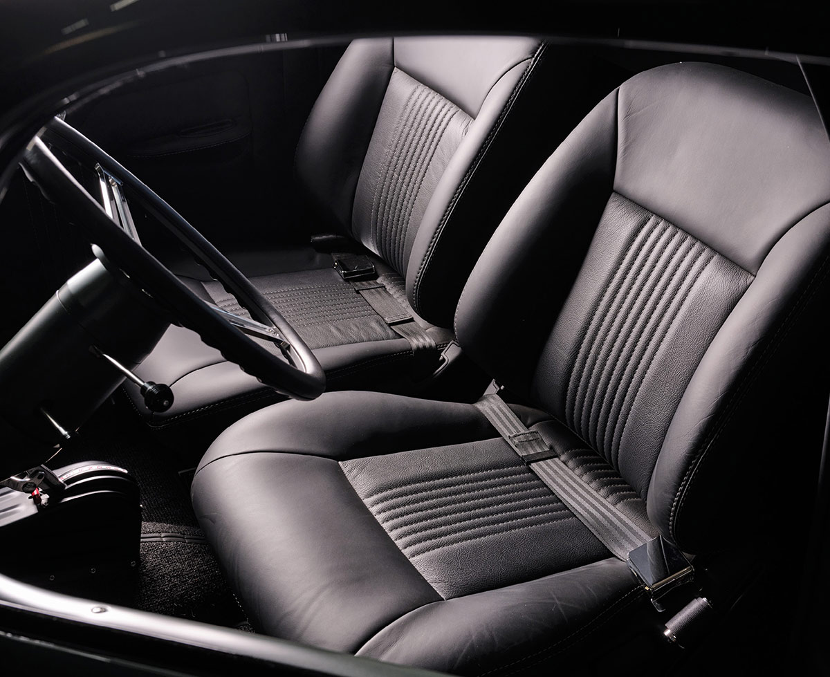 Custom charcoal gray leather bucket seats