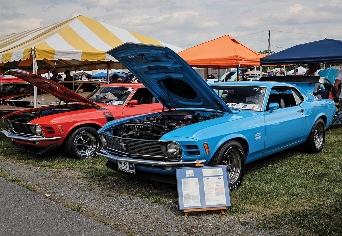 Blue Boss 429 Mustang with factory documentation.
