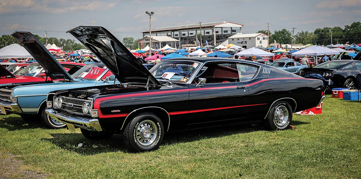 Black and red Mercury Cyclone GT muscle car.
